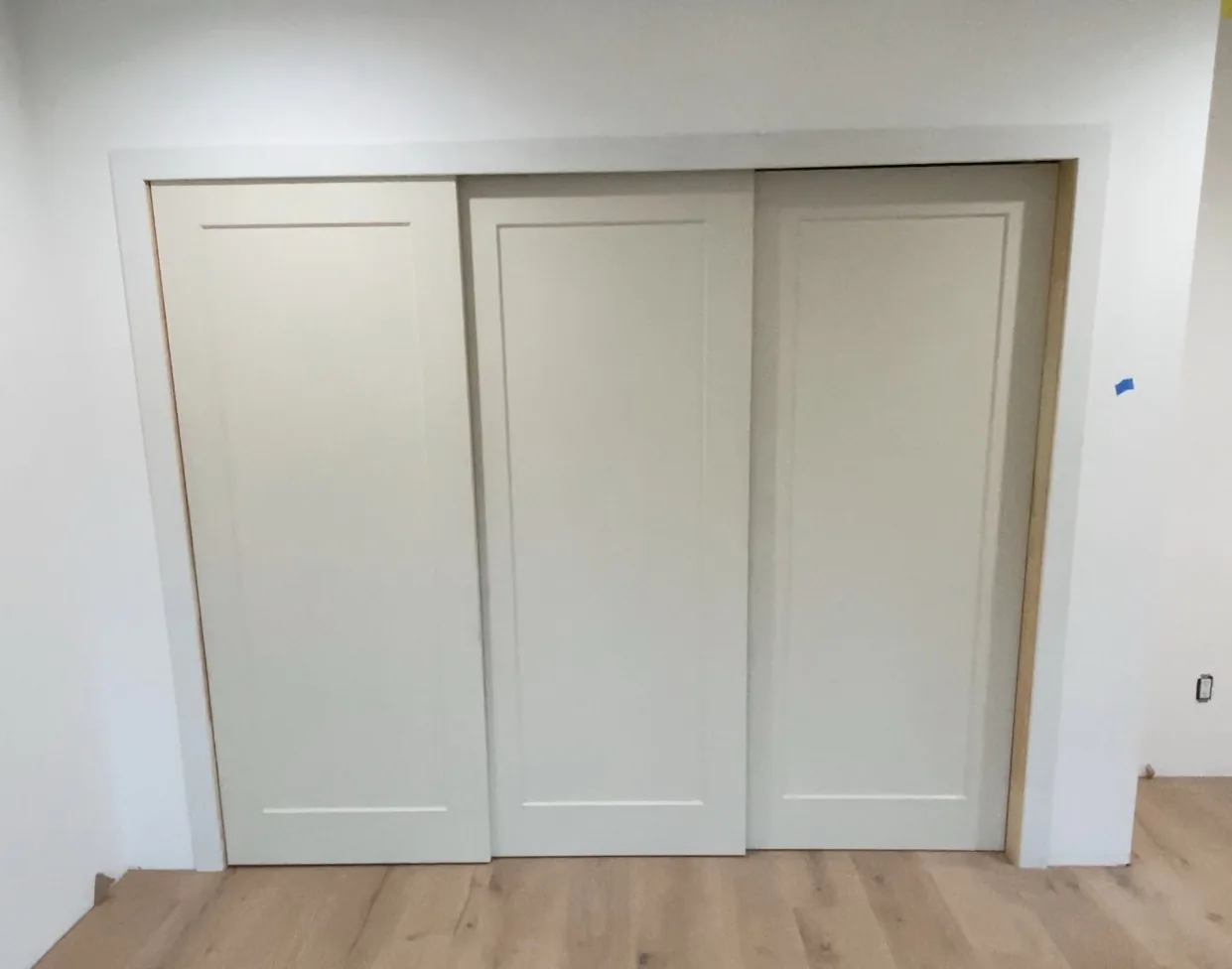 Unpainted triple bypass door installation completed at E Calle Ventura