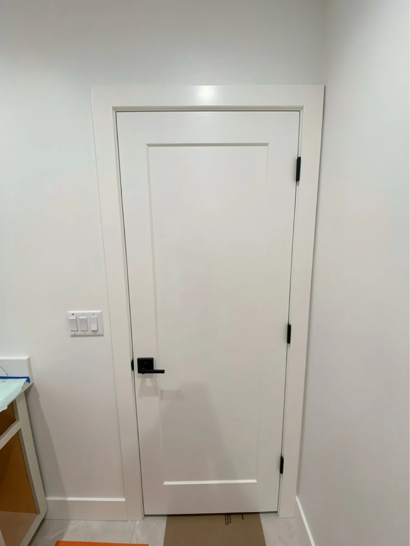 Finished interior door with lever hardware at E Calle Ventura