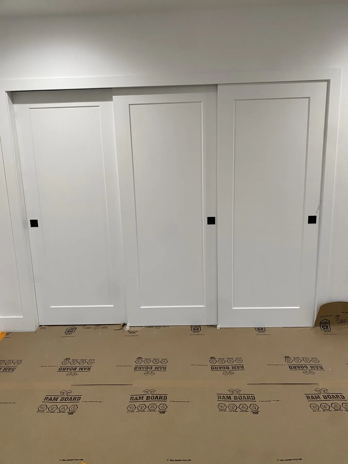 Finished triple bypass door installation from the E Calle Ventura project in Scottsdale