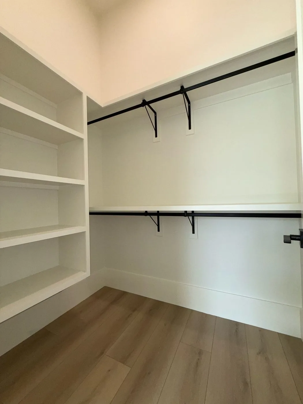 Closet shelving, closet rods, door hardware, and 9 1/4 inch flat base at The El Sendero Project