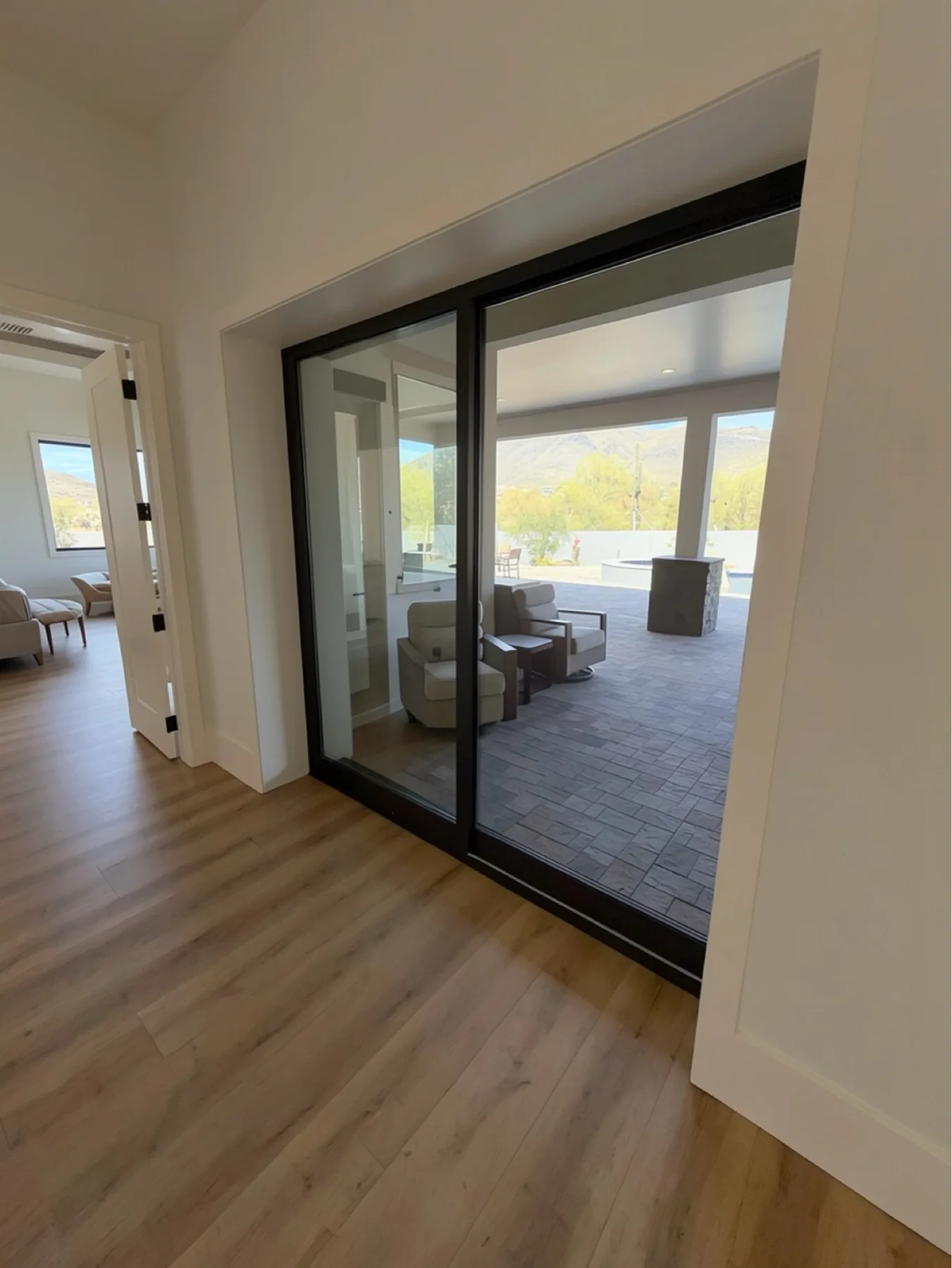 Large slider jamb and casing detail at The El Sendero Project