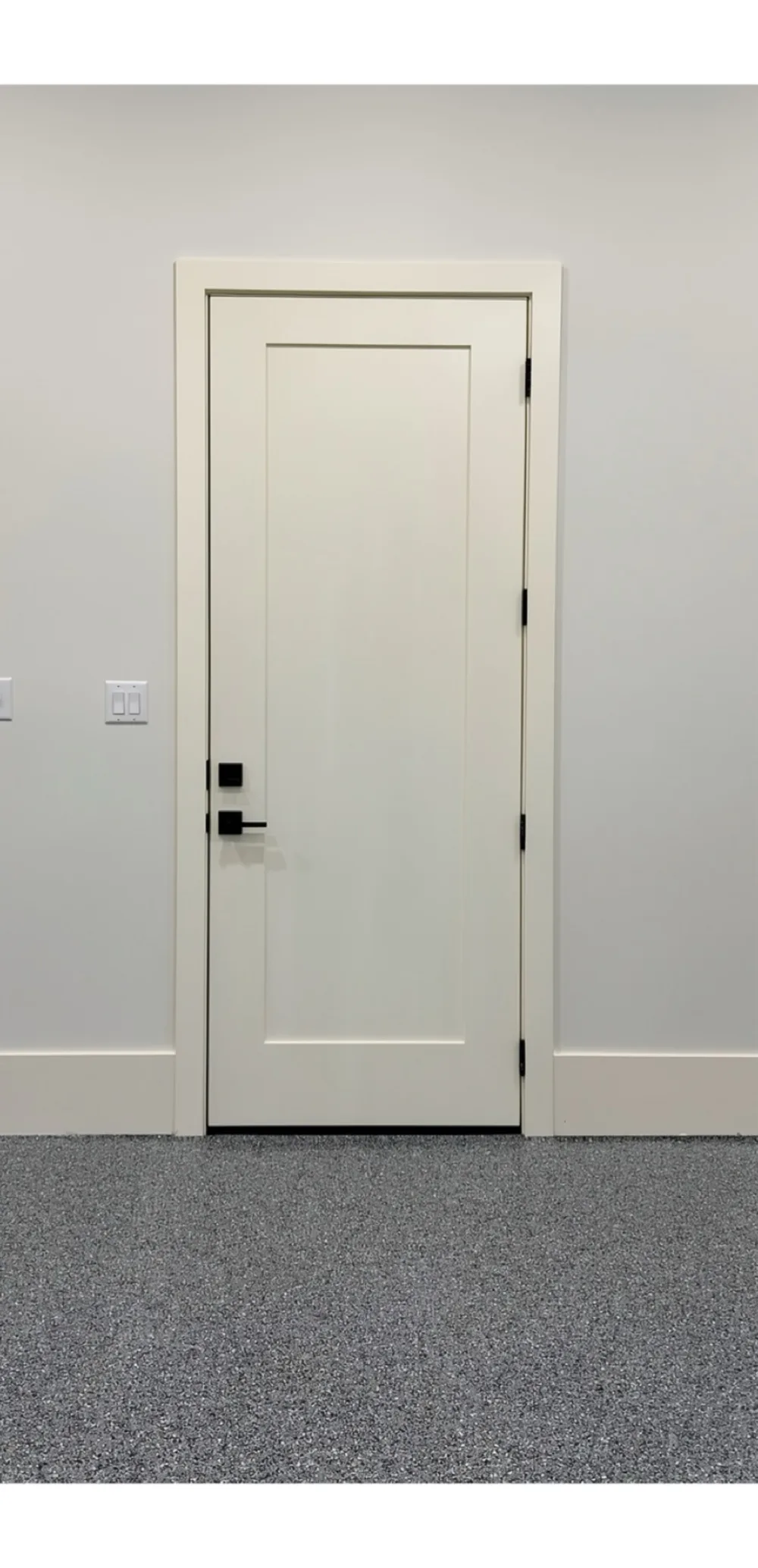 Interior side of an installed entry door showing jamb, casing, and hardware by Retro Fit Installation LLC
