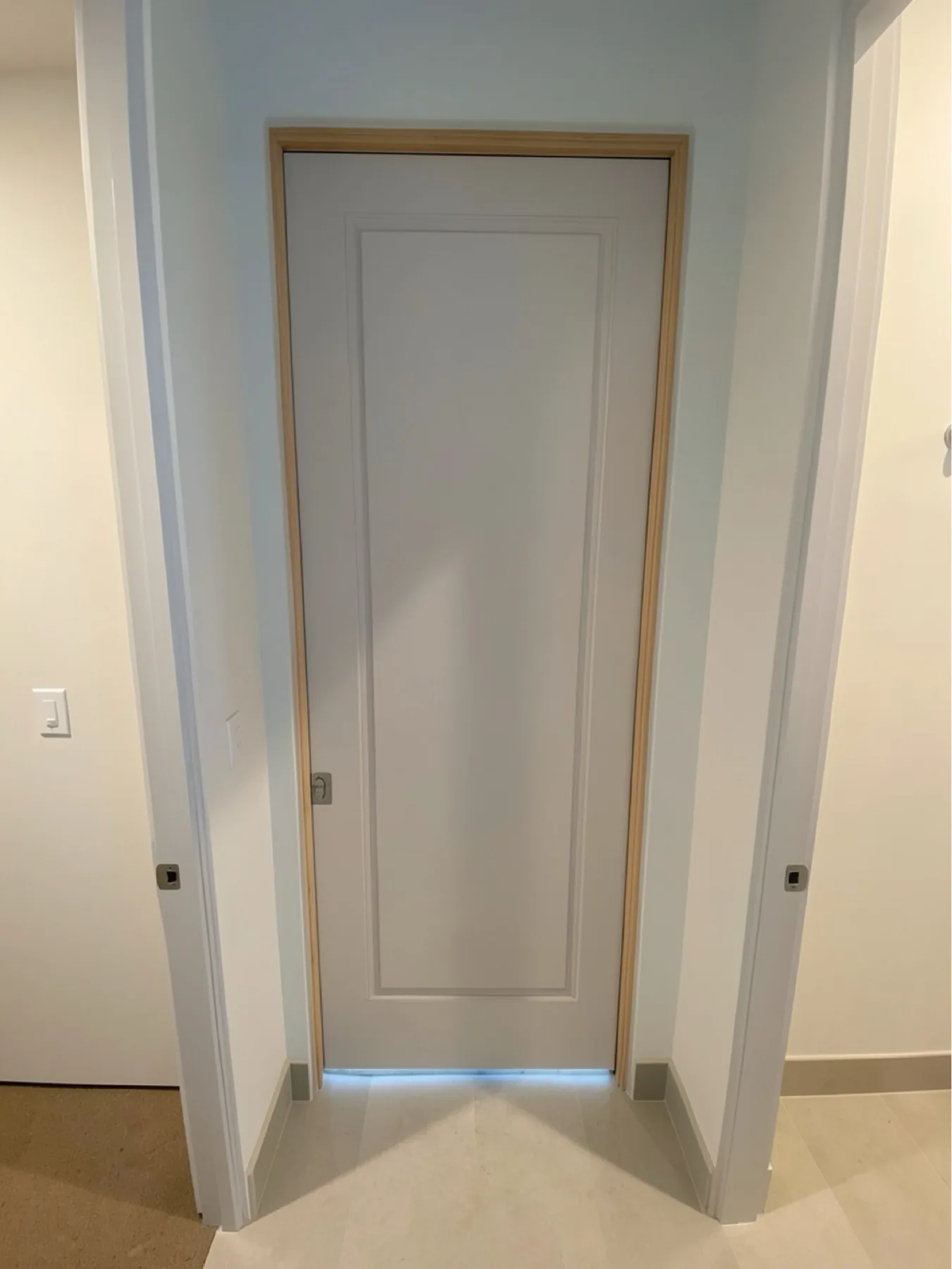 Finished pocket door opening and casing at The Phoenician Project