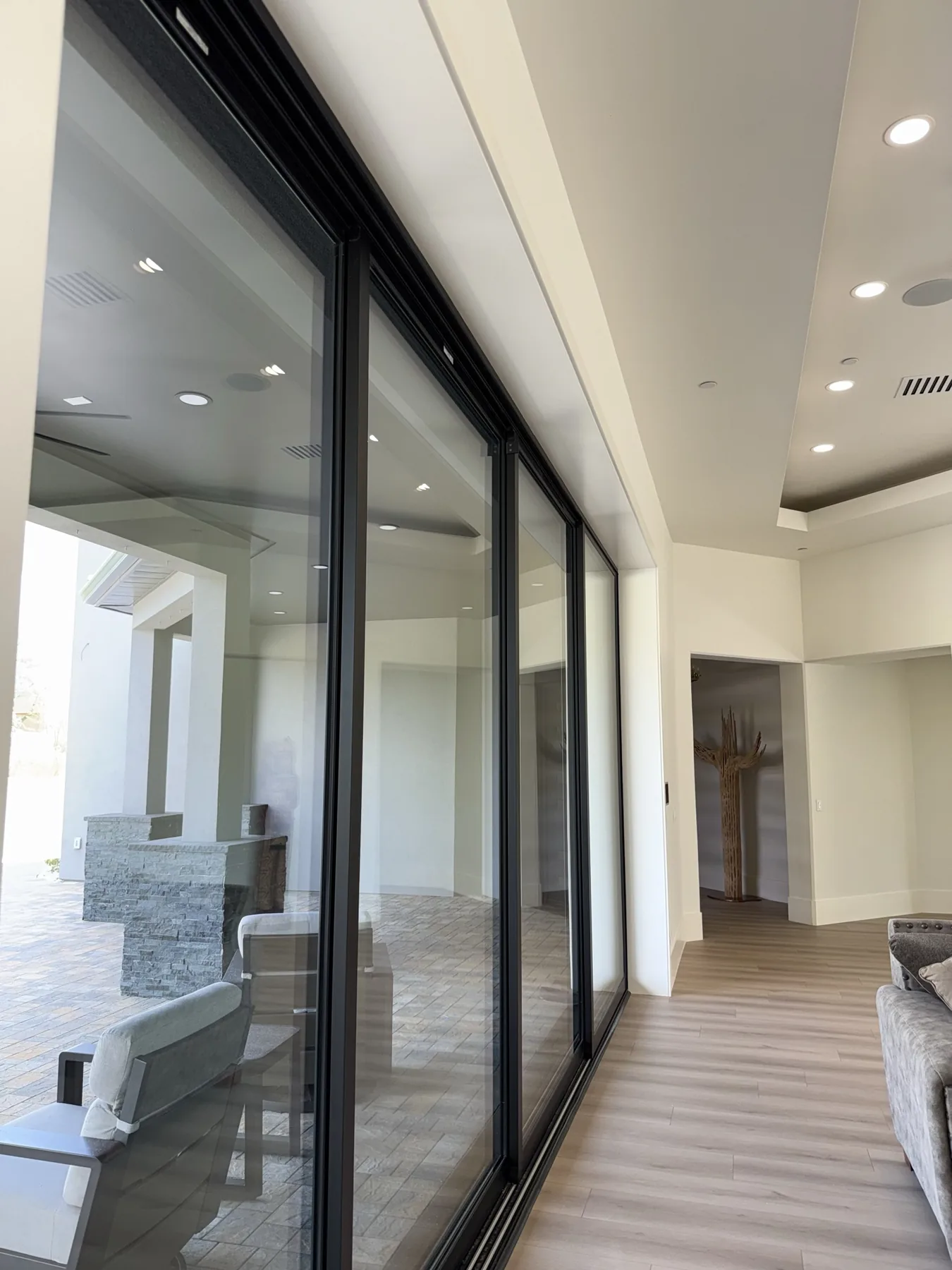 Large slider casing and baseboard finish work at The El Sendero Project